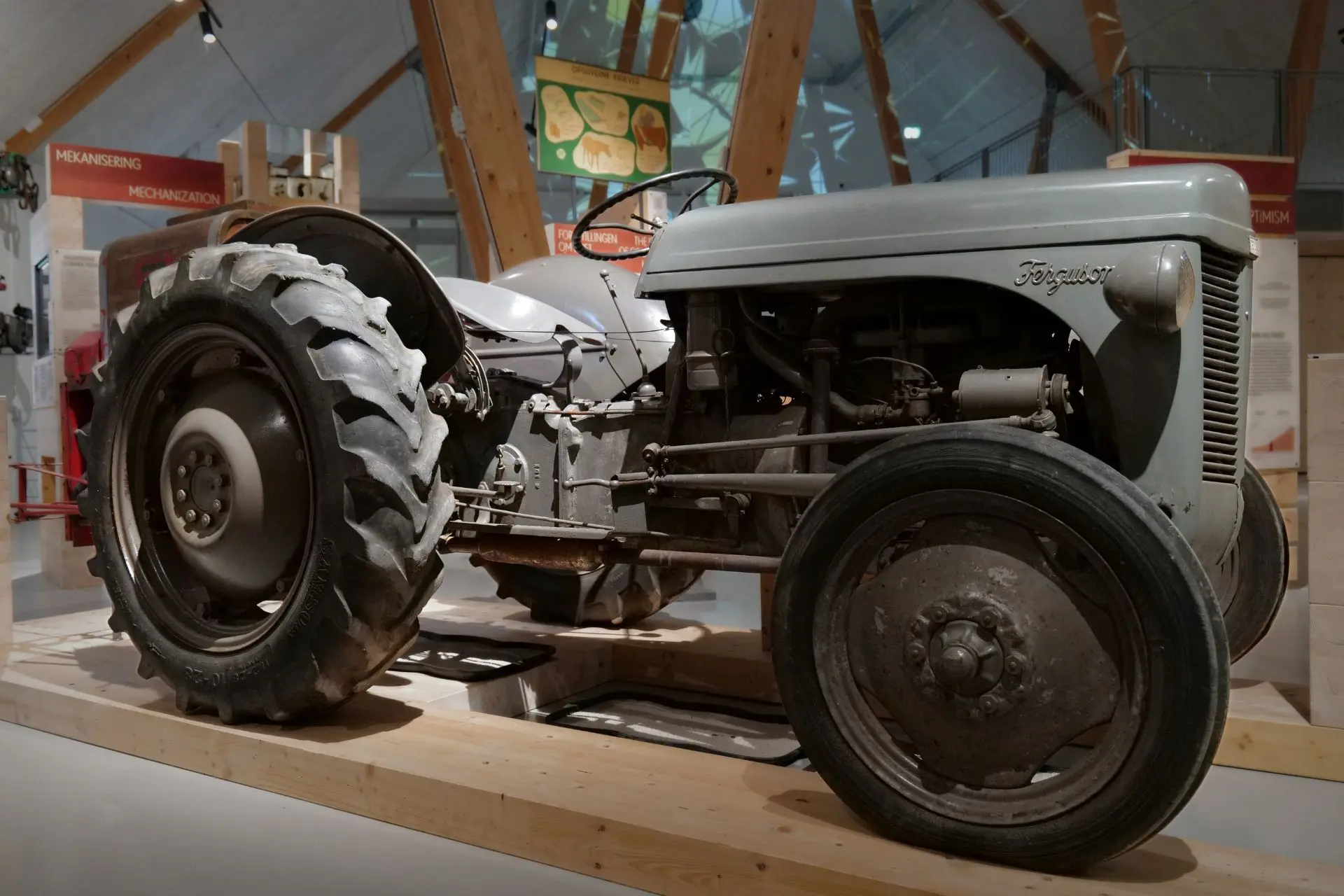 The picture shows a gray Ferguson tractor in the exhibition Under the Sun at the Green Museum.