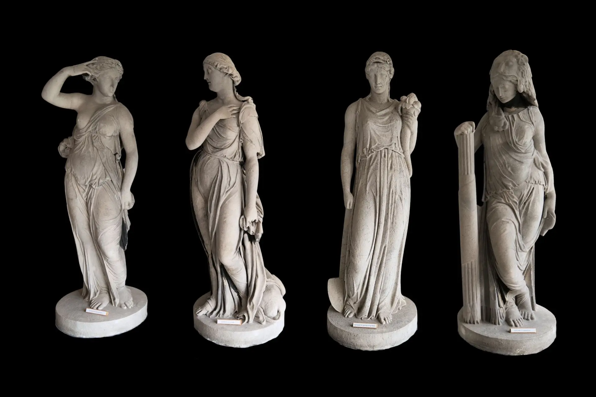 Goddesses of Liberty Support The picture shows the four female figures from the Liberty Pillar. Today the statues can be seen at the Green Museum.