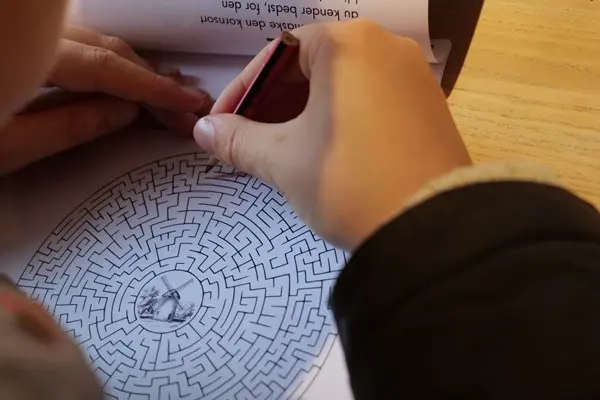 Child makes educational material about grains at The Green Museum